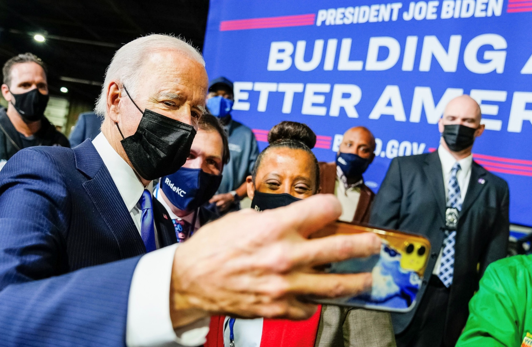 Biden taking a selfie with an immigrant