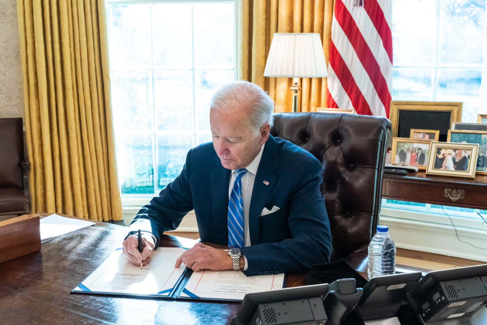 Biden signs immigration legislation.