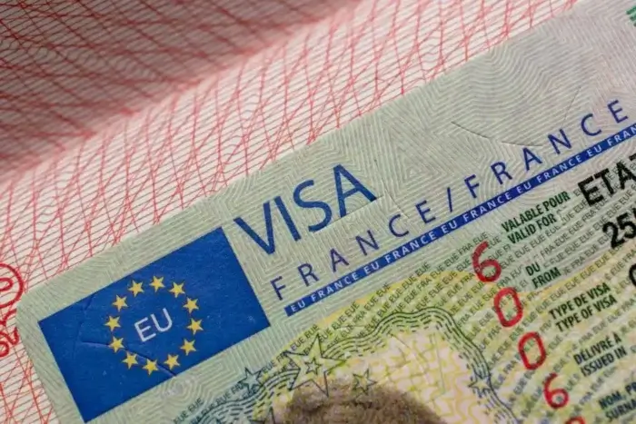 Close-up of a French visa, part of the official travel and residency documentation required for entry into France